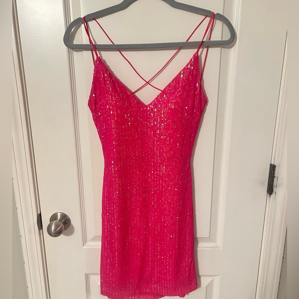 Pretty pink sequin dress with a beautiful back. Worn once.